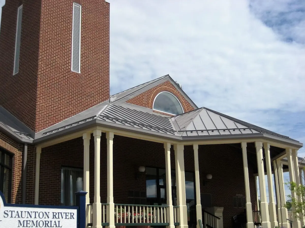 Skilled roofing craftsmen working on a residential roof in Elkton